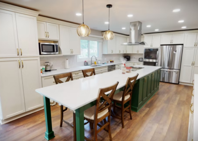 WOODSTREAM FARMS KITCHEN REMODEL - Kraftmaid cabinets, LVT flooring, Quartz countertops. Large Island, Island range hood, Tile backsplash