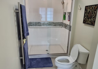 SYLVANIA BATHROOM REMODEL - After, LVT flooring, tile shower, towel warmer