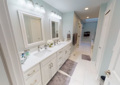 LONG BATHROOM REMODEL - Long bathroom remodel with tile floors and quartz countertops.
