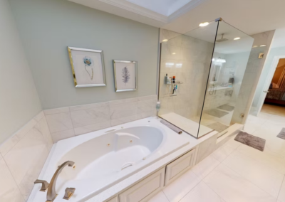 LONG BATHROOM REMODEL - Long bathroom remodel with tiled walk-in shower, tiled bench, glass surround, jetted tub and tile flooring